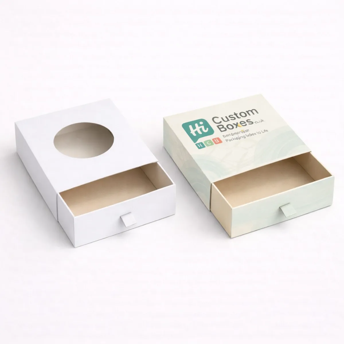 Two drawer-style slide boxes- featuring a circular window and a small fabric pull tab- class=